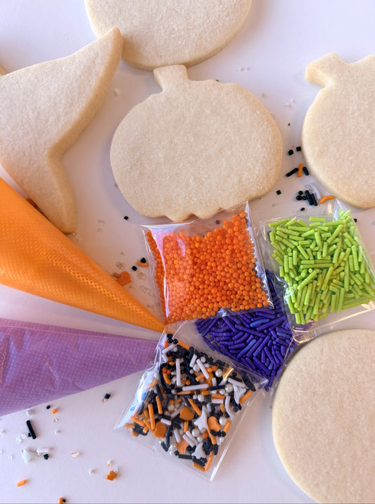 DIY Halloween sugar cookie kit with cookies, icing bags and sprinkles